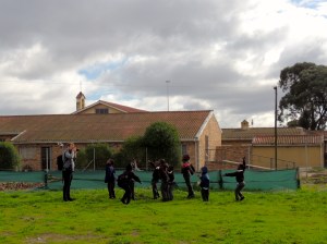 Students mobbing another camera