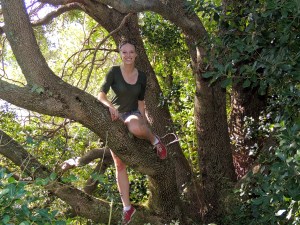 Climbing a tree in the gardens