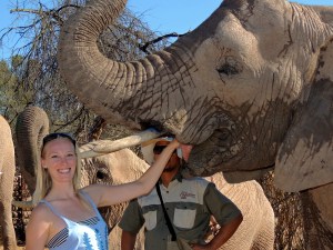 Giving Malaika some fruit