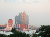 Icecube building - it's actually a new opera house - at sunset. It has cost taxpayers way more than initially planned, partly due to the fact that it requires special glass so as not to affect the ships through reflections when they are coming in... a lot of this glass was broken during construction by some careless workers, so had to be replaced.