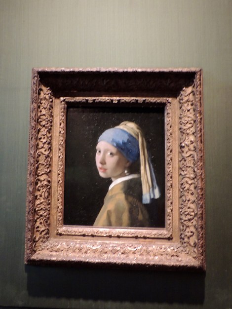 Girl With A Pearl Earring, Vermeer, 1665. It's really a beautiful work, and was under-appreciated at the time it was painted - selling at an auction in 1881 for two euros and thirty cents.